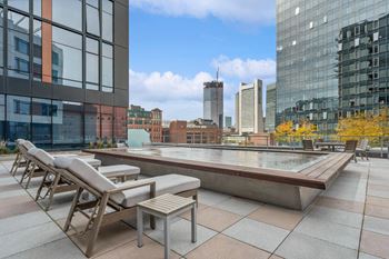 Sundeck + ebb & flow water feature + boston views